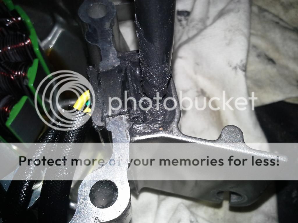 Oil leak at stator cover wiring rubber plug StromTrooper